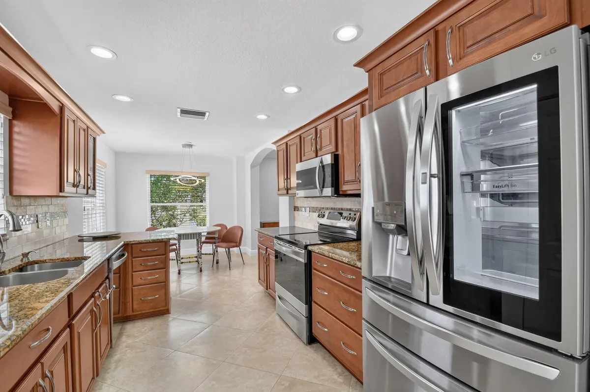Updated Granite Kitchen at 12447 Crystal Pointe Drive 201, Boynton Beach