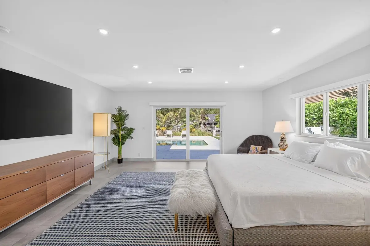 Private Primary Suite Opens to Pool Area at 41 S COMPASS Drive, Fort Lauderdale