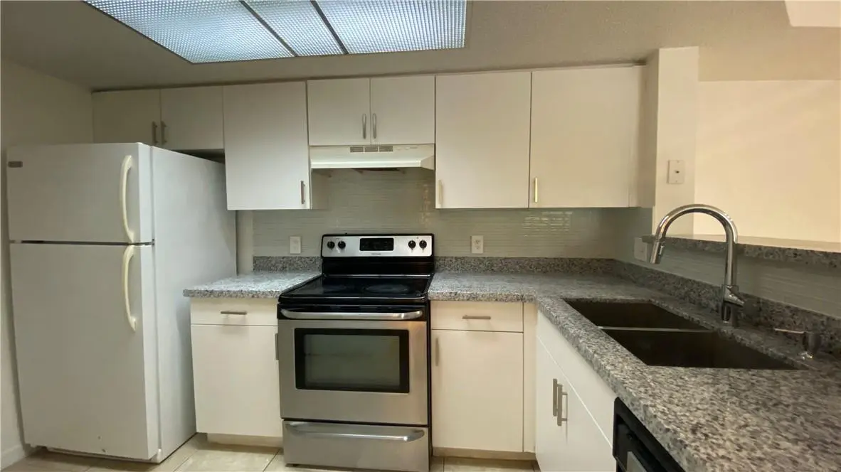 Photo 5 at 5045 Wiles Road 205, Coconut Creek