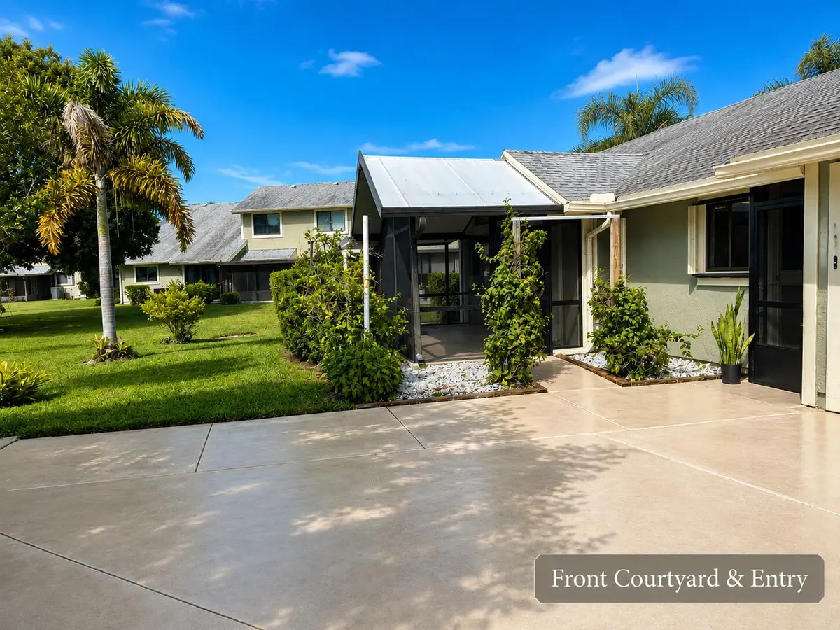 Front Courtyard & Entry Colchester at 1417 SE COLCHESTER Circle, Port St. Lucie