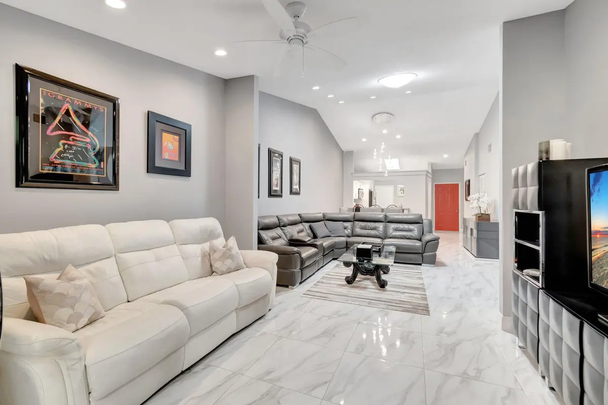 DEN/LIVING ROOM at 10927 DOLPHIN PALM Court A, Boynton Beach