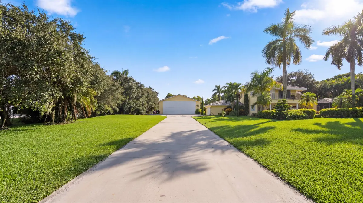 Situated on 1.78 Acres at 10861 DENOEU Road, Boynton Beach