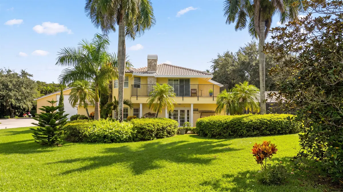 Front Exterior at 10861 DENOEU Road, Boynton Beach