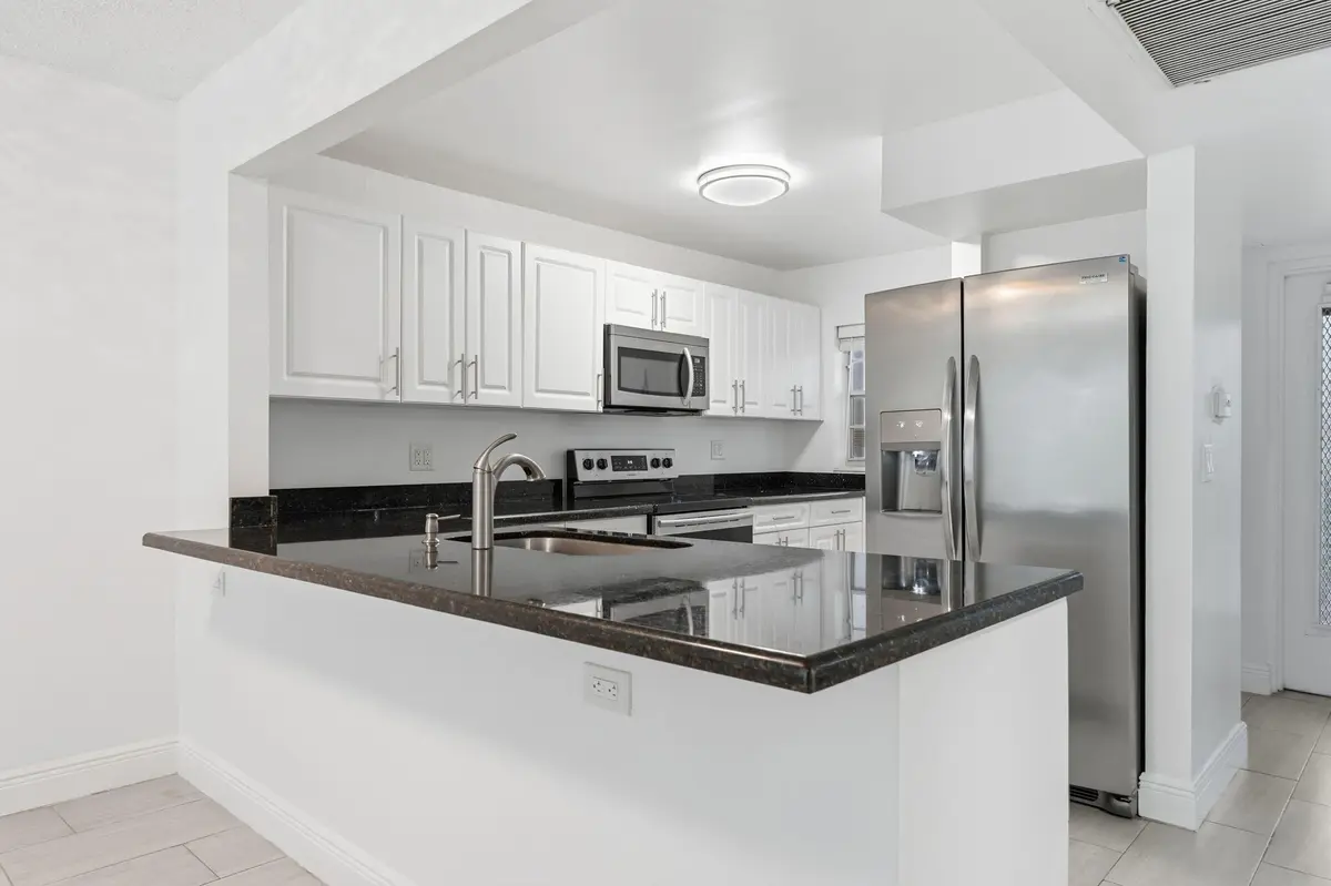 12-web-or-mls-9325_Lagoon_Pl_Unit_405_01 at 9325 LAGOON Place 405, Davie