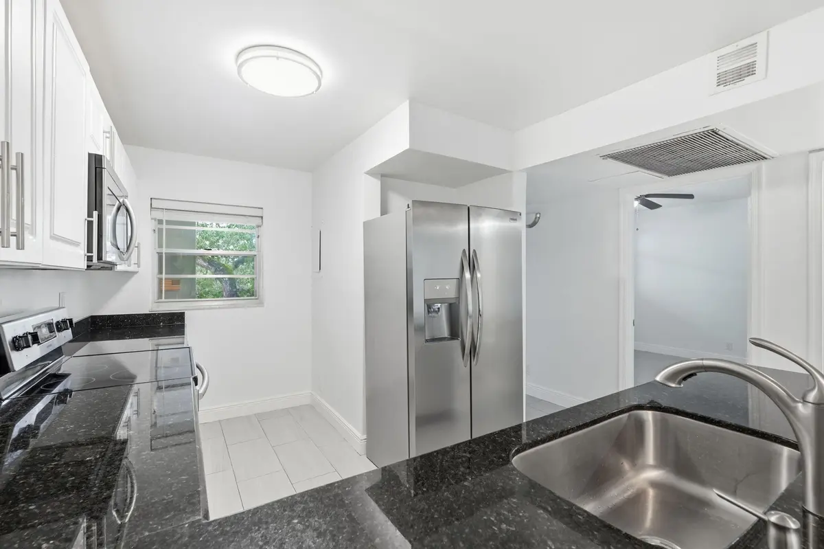 13-web-or-mls-9325_Lagoon_Pl_Unit_405_01 at 9325 LAGOON Place 405, Davie