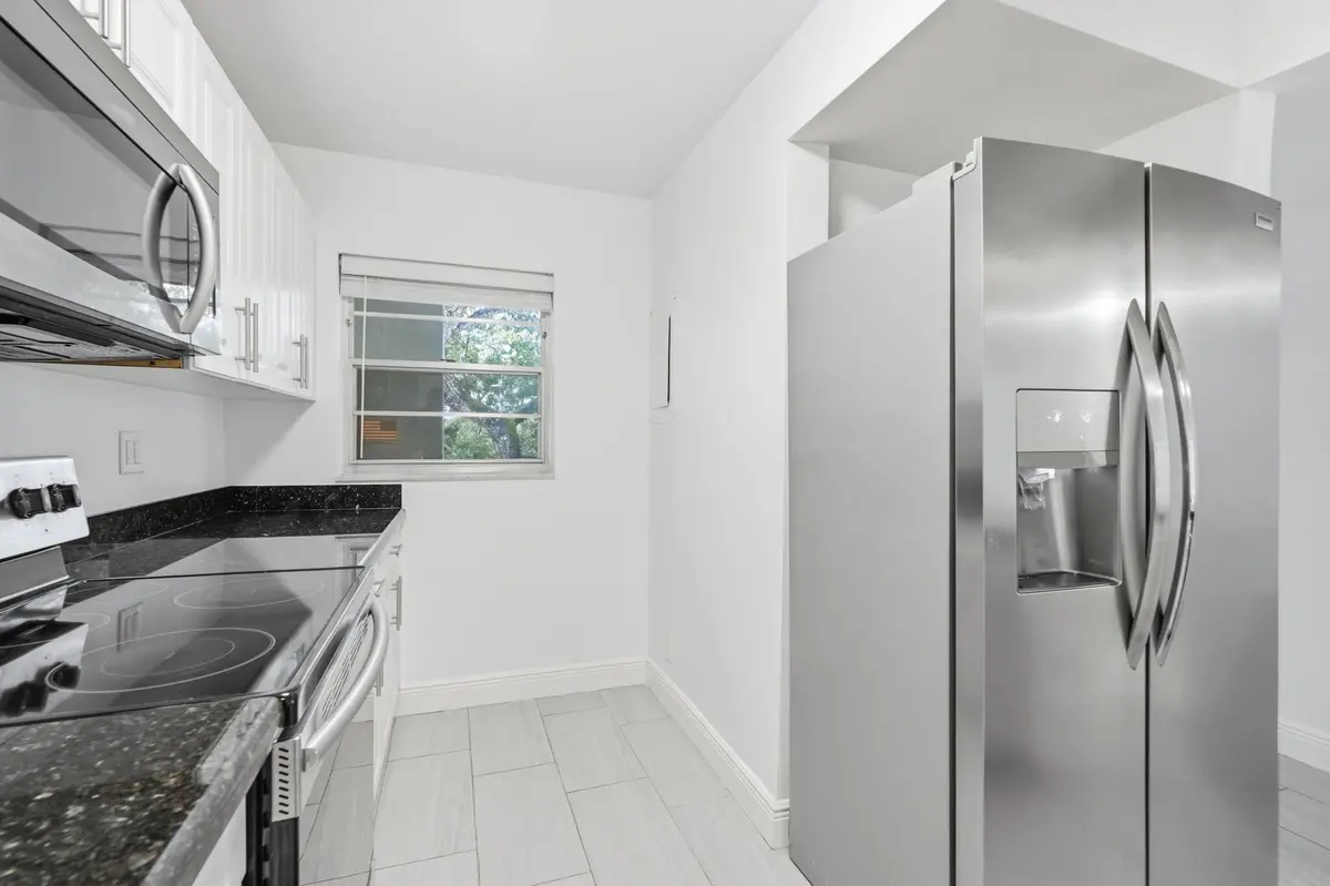 14-web-or-mls-9325_Lagoon_Pl_Unit_405_01 at 9325 LAGOON Place 405, Davie