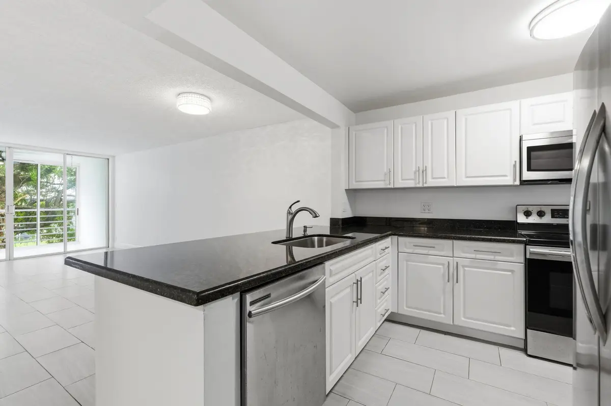 16-web-or-mls-9325_Lagoon_Pl_Unit_405_01 at 9325 LAGOON Place 405, Davie