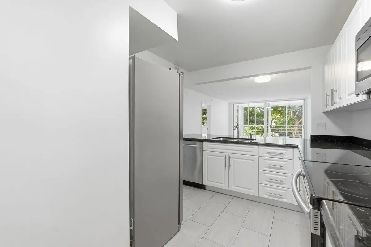 17-web-or-mls-9325_Lagoon_Pl_Unit_405_01 at 9325 LAGOON Place 405, Davie