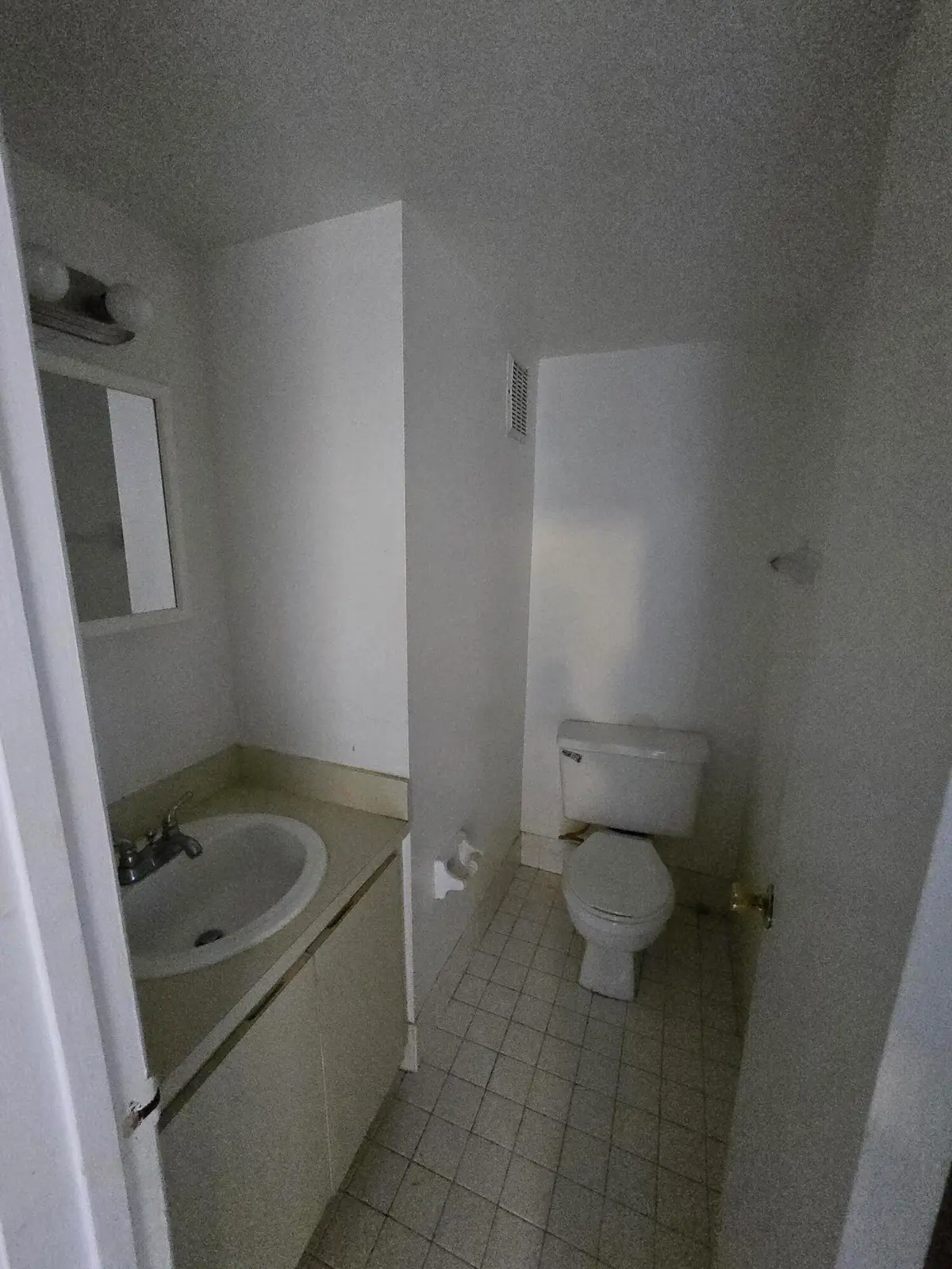 1st floor half bathroom at 11101 Royal Palm Boulevard 213, Coral Springs
