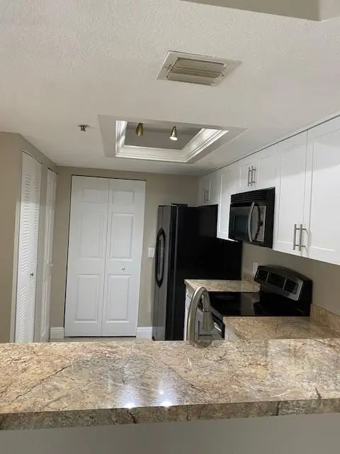 Photo 2 at 5061 Wiles Road 205, Coconut Creek