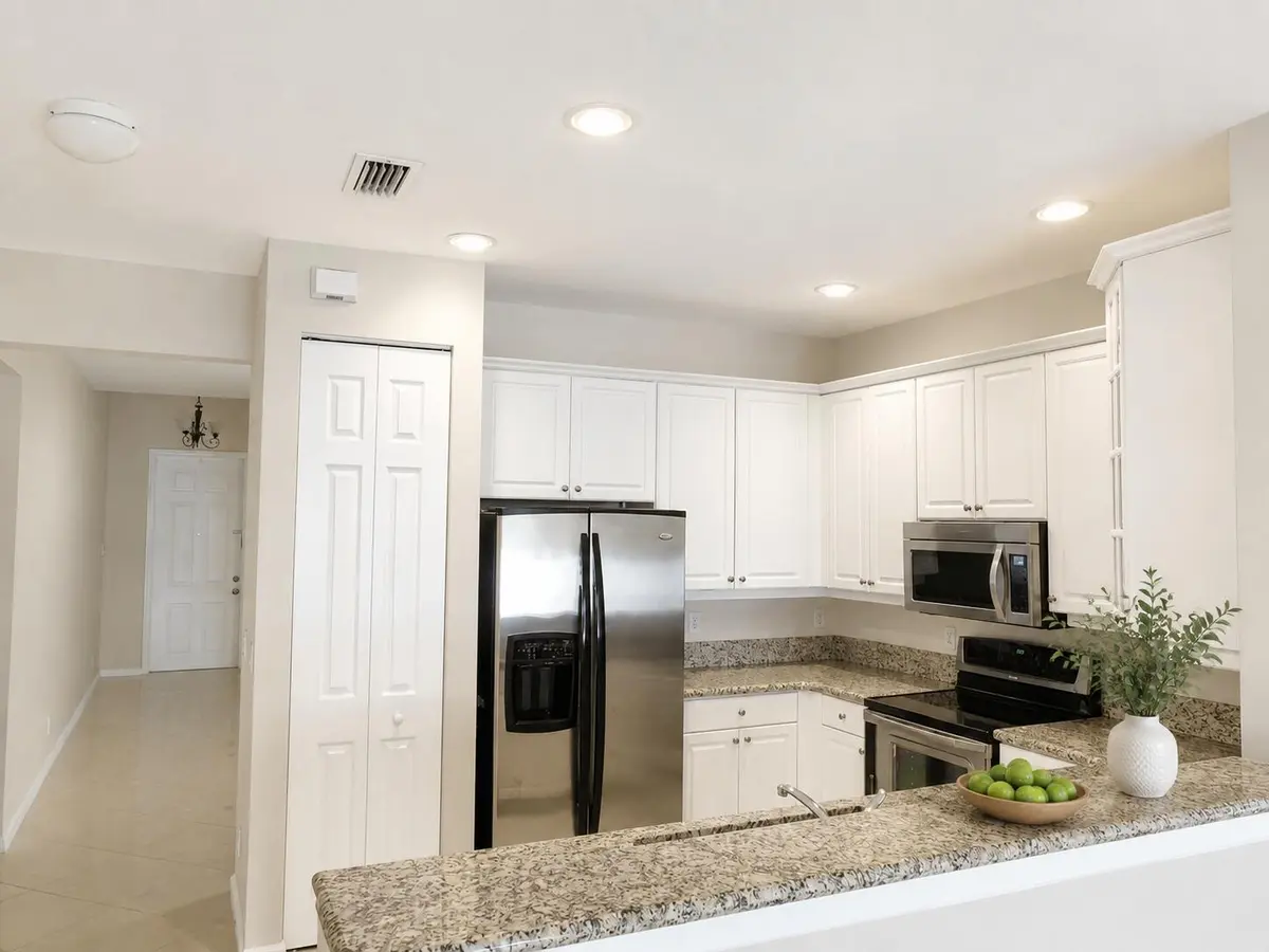 Brightened Kitchen with Soft Greige Wall at 168 Belle Grove Lane, West Palm Beach