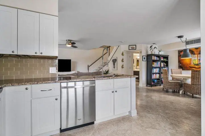 123 another view of kitchen and open con at 123 Yacht Club Way 102, Hypoluxo