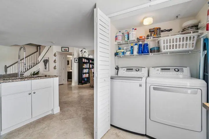 123 designated laundry area and extra st at 123 Yacht Club Way 102, Hypoluxo