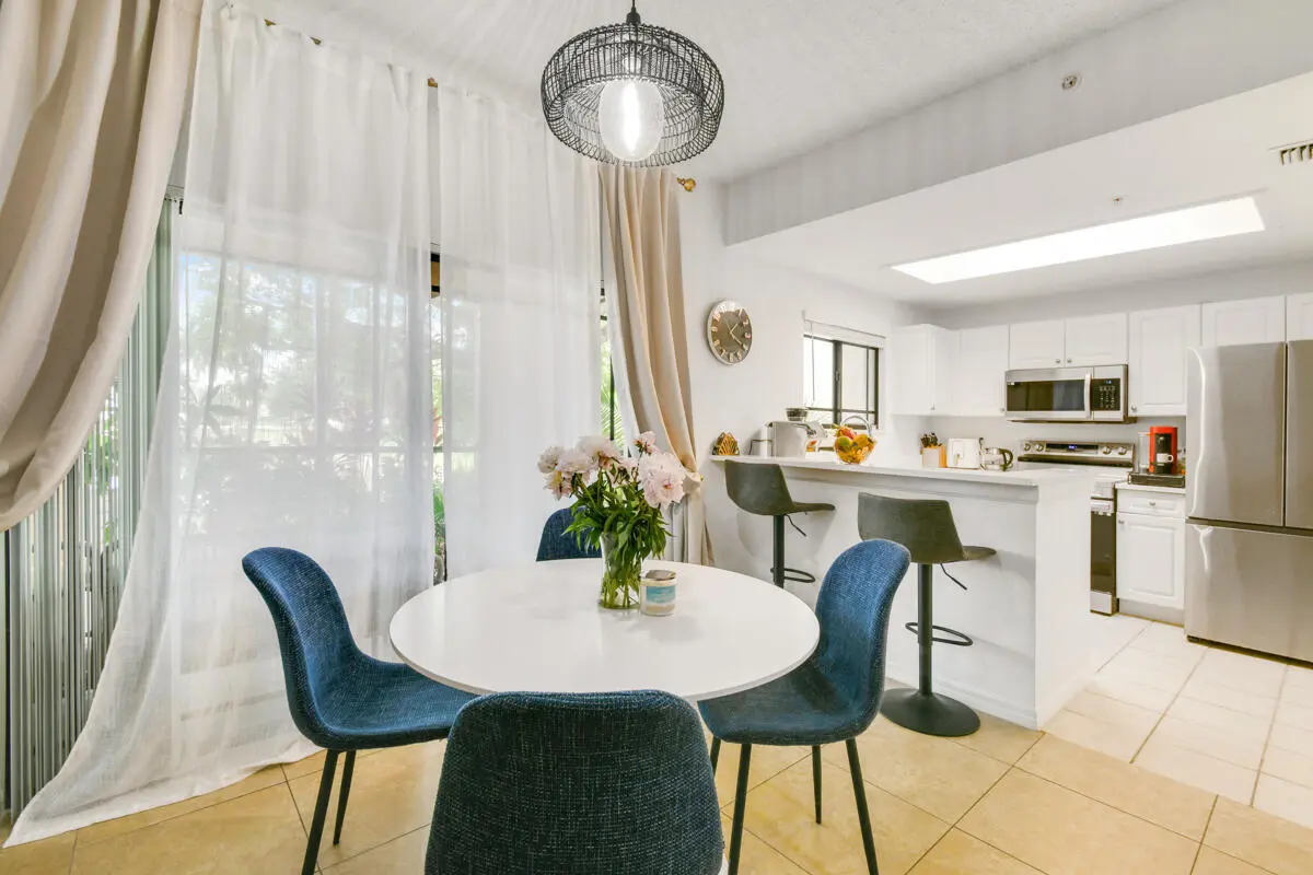 dining aera & kitchen at 2916 TUSCANY Court 104, Palm Beach Gardens