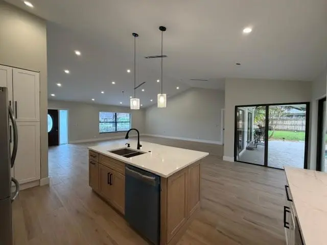 Kitchen open to Living room at 199 SW 15th Court, Boca Raton