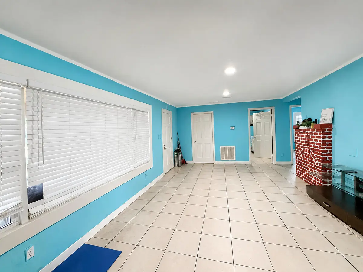 MLS_Enhanced_04_Living_Room_Reverse at 1204 Easter Avenue, Fort Pierce