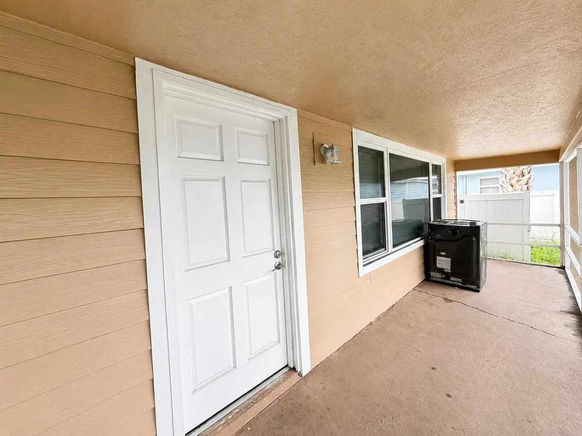 MLS_Enhanced_18_Screened_Porch_Entry at 1204 Easter Avenue, Fort Pierce