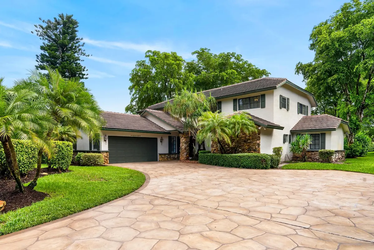 004-021-Front of Home-4000x2674 at 7100 E Cypresshead Drive, Parkland