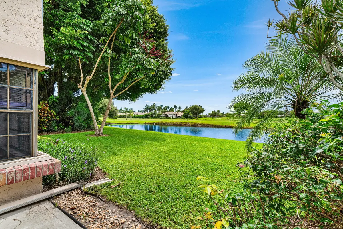 Backyard Patio w/ Room to BBQ at 5260 Fairway Woods Drive 3911, Delray Beach