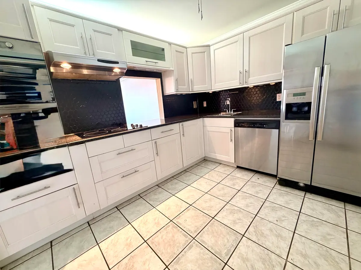 WALL OVEN & MICROWAVE WITH GLASS COOKTOP at 1502 S Lakeside Drive #401, Lake Worth Beach