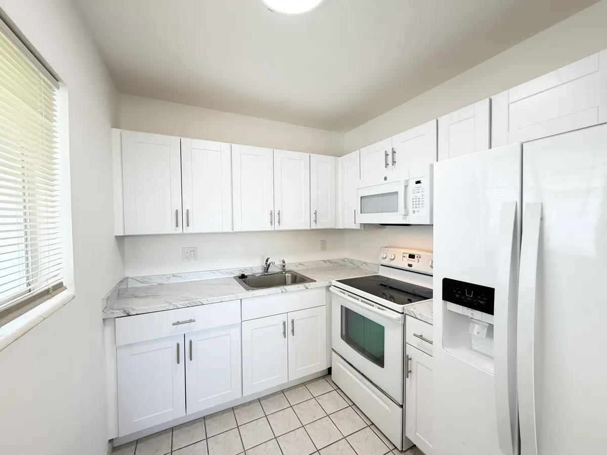 Kitchen with window at 3402 Cynthia Lane 205, Lake Worth Beach