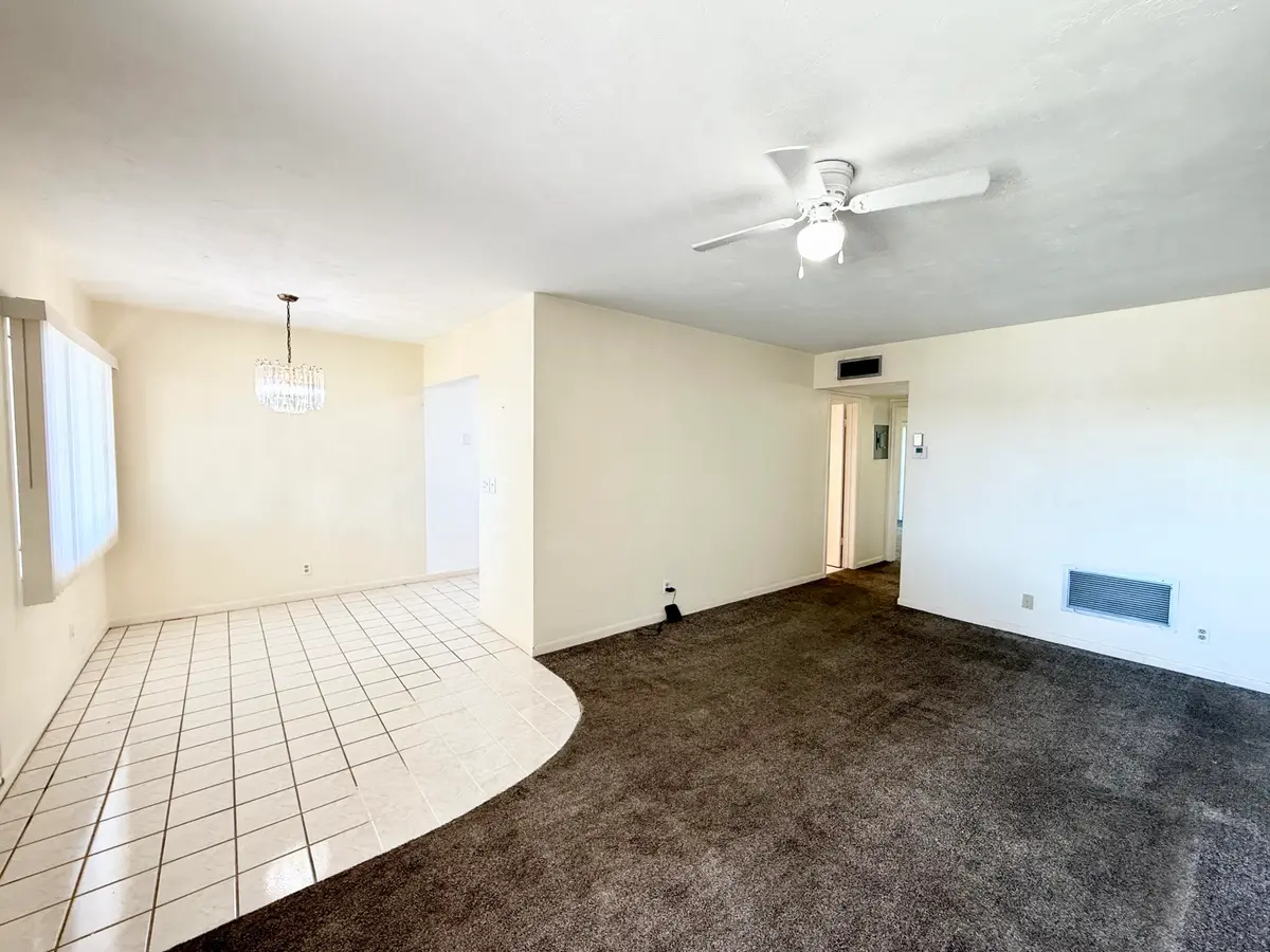 Living room with dining area at 3402 Cynthia Lane 205, Lake Worth Beach