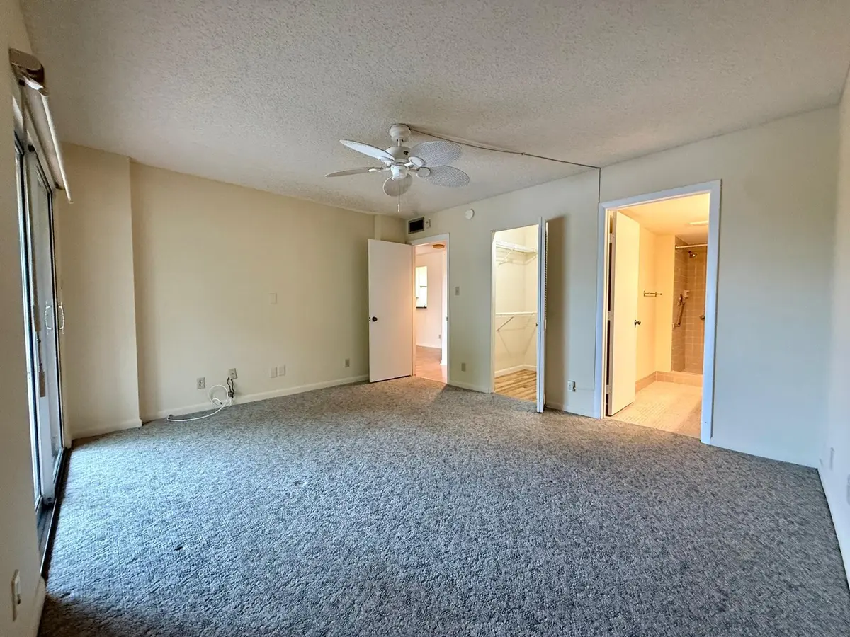 Master bedroom at 2212 S CYPRESS BEND Drive 303, Pompano Beach