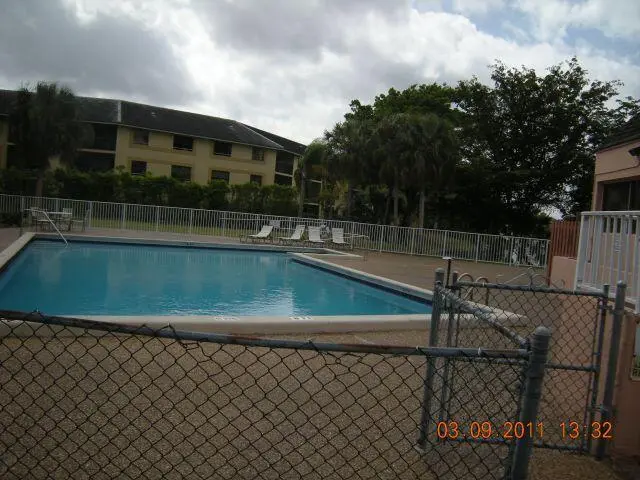 8921 pool at 8921 NW 28th Drive F, Coral Springs