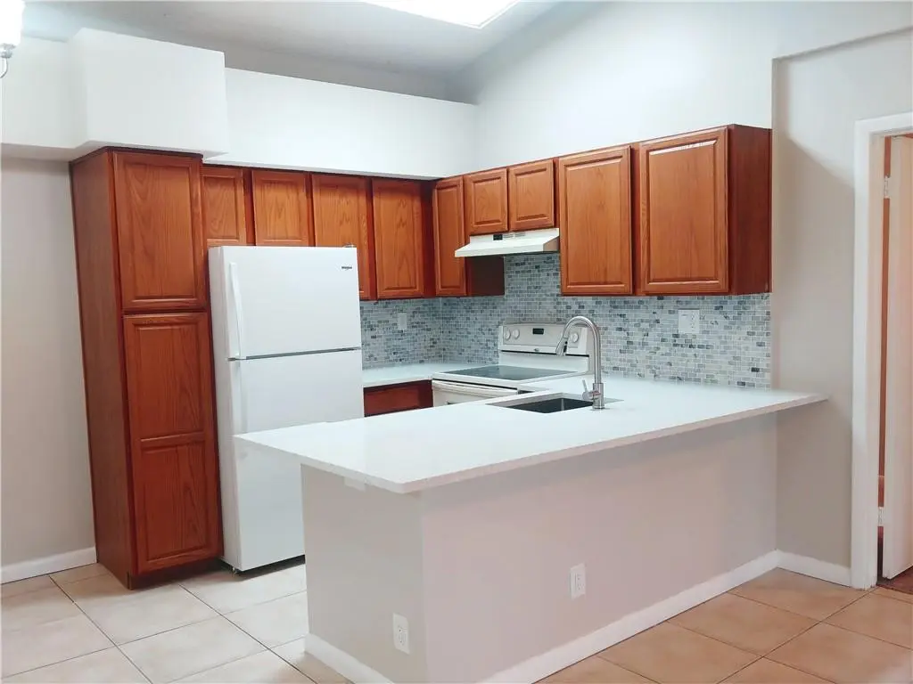 Photo 2 at 921 Lyons Road 3206, Coconut Creek