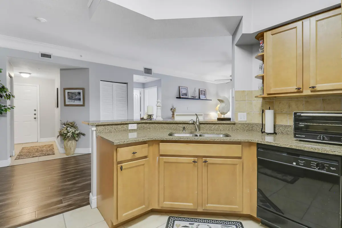 Kitchen and Great Room at 8303 MYRTLEWOOD Circle, Palm Beach Gardens