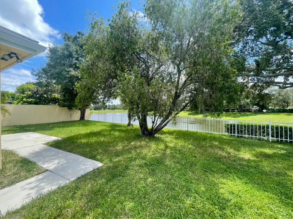 Overlooks Lake at 2571 SW Greenwich Way, Palm City