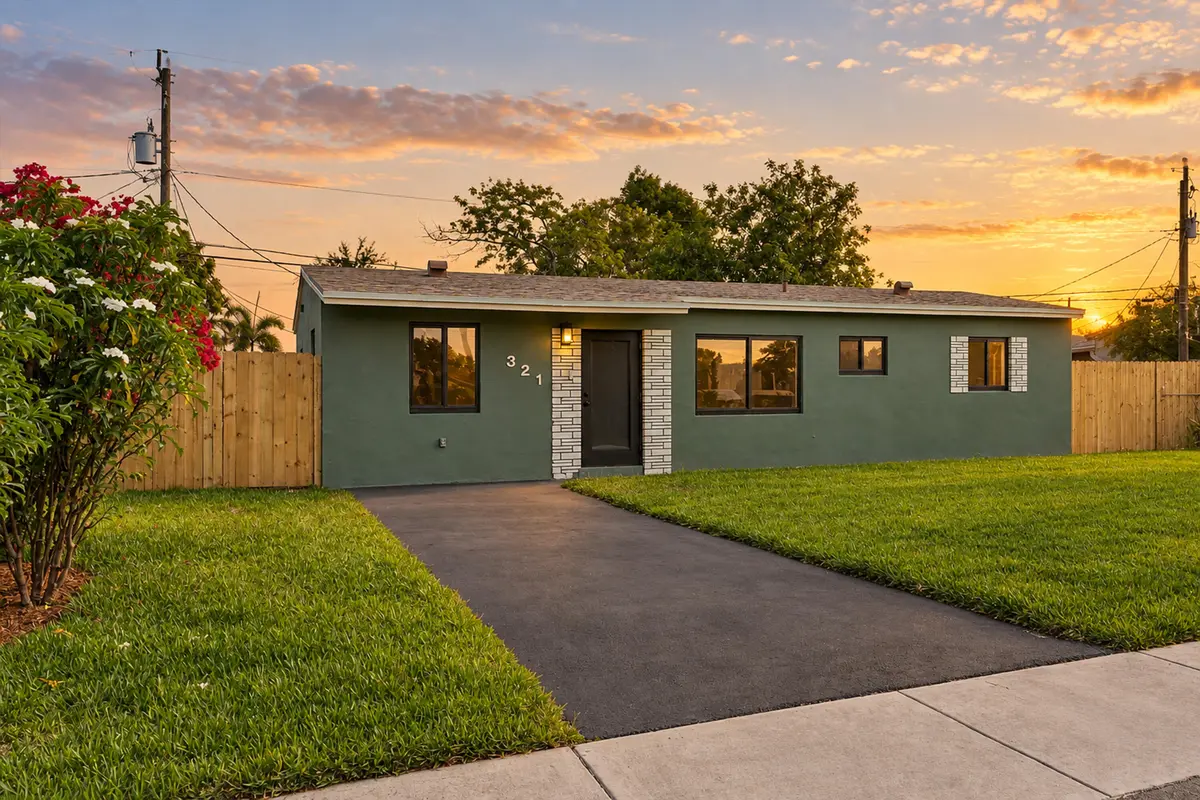 Front Yard GOOD at 321 NE 59th Street, Oakland Park