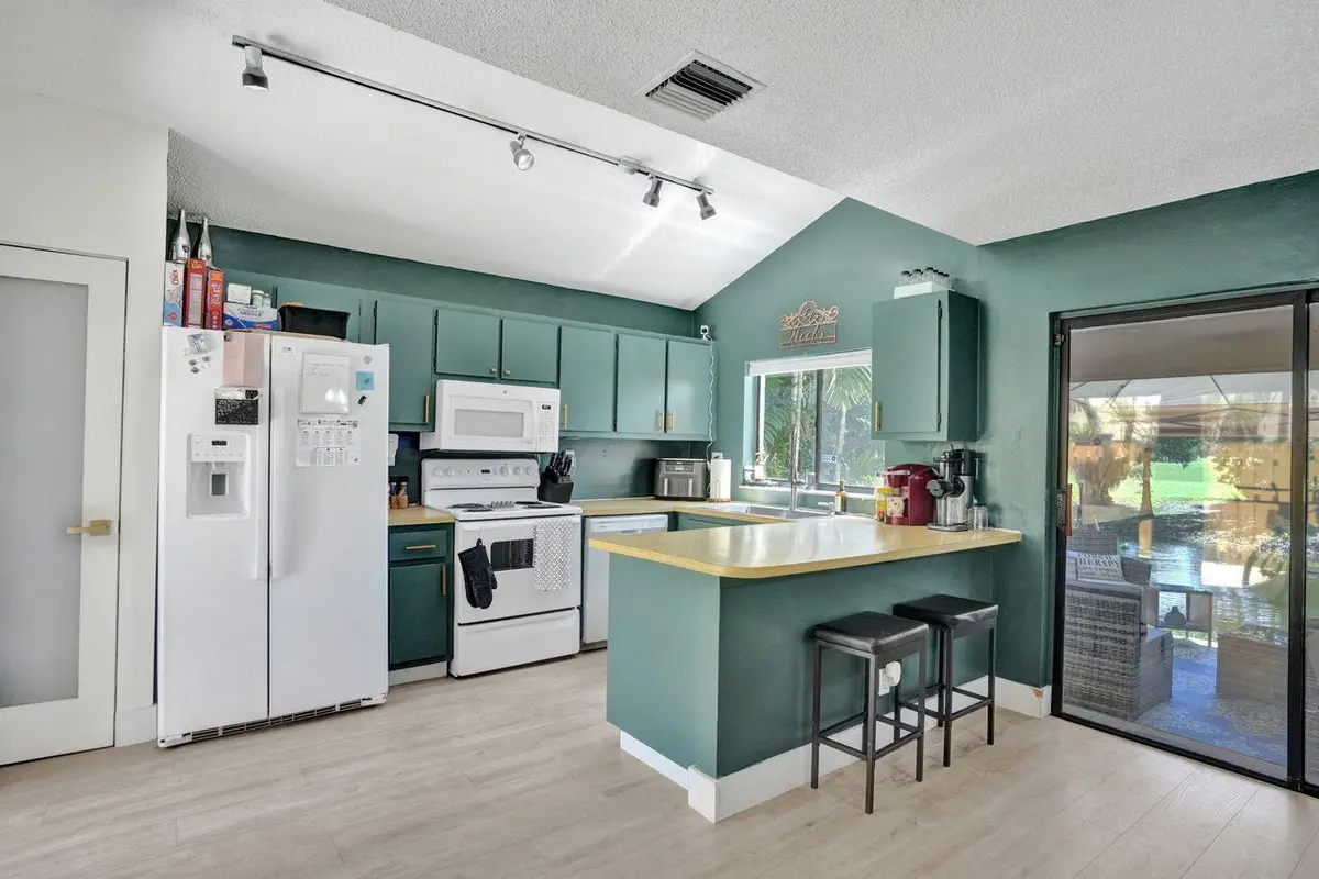 Kitchen & Water View at 734 NW 132nd Terrace, Plantation