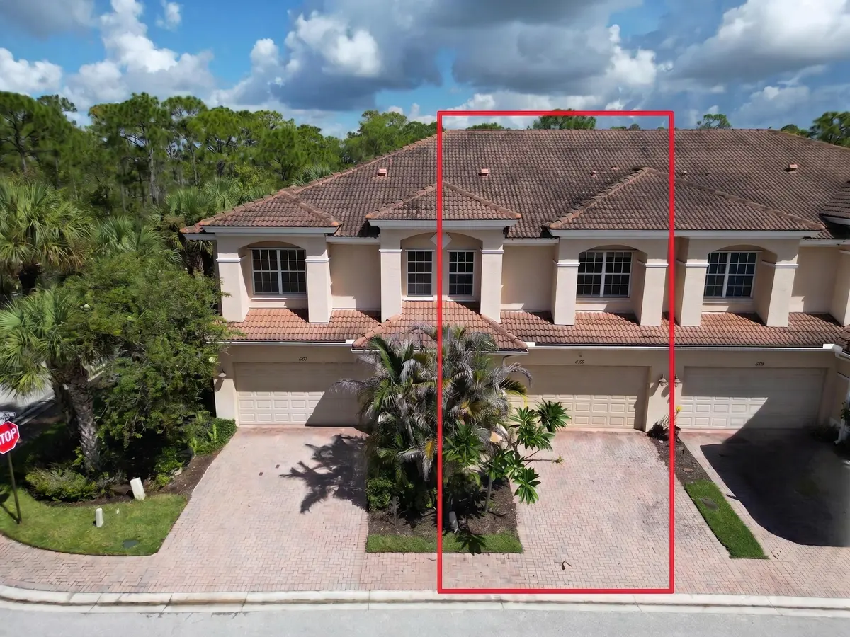 Front low aerial with red box at 423 SW Walking Path, Stuart