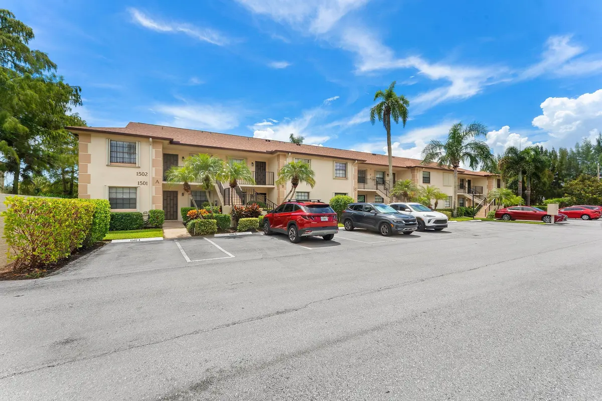 Front of Building at 1502 PINECREST Circle C, Jupiter