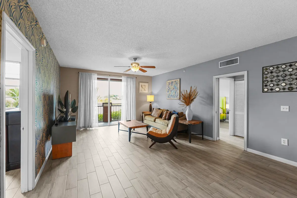 Living Room at 11750 Saint Andrews Place 203, Wellington