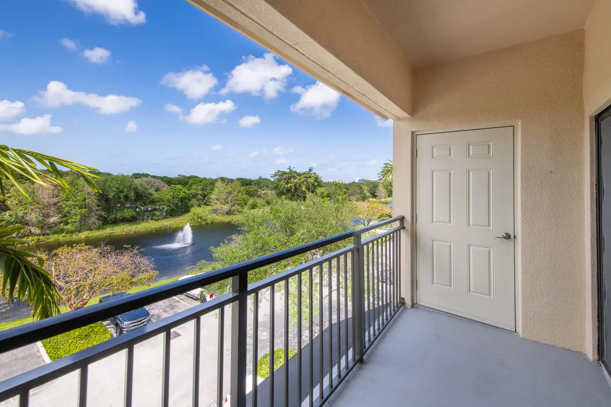 LR Balcony Lake View at 4907 Midtown Lane 1411, Palm Beach Gardens