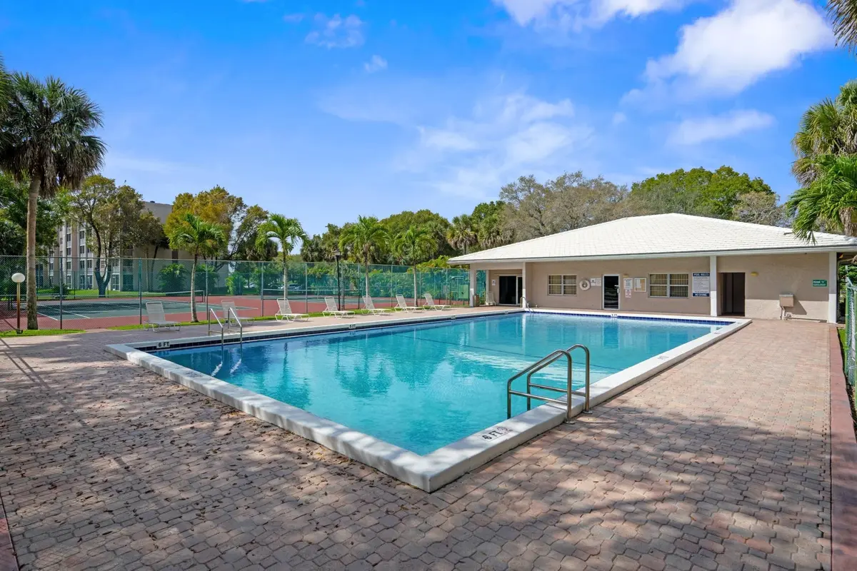 Photo 2 at 8735 RAMBLEWOOD Drive 409, Coral Springs