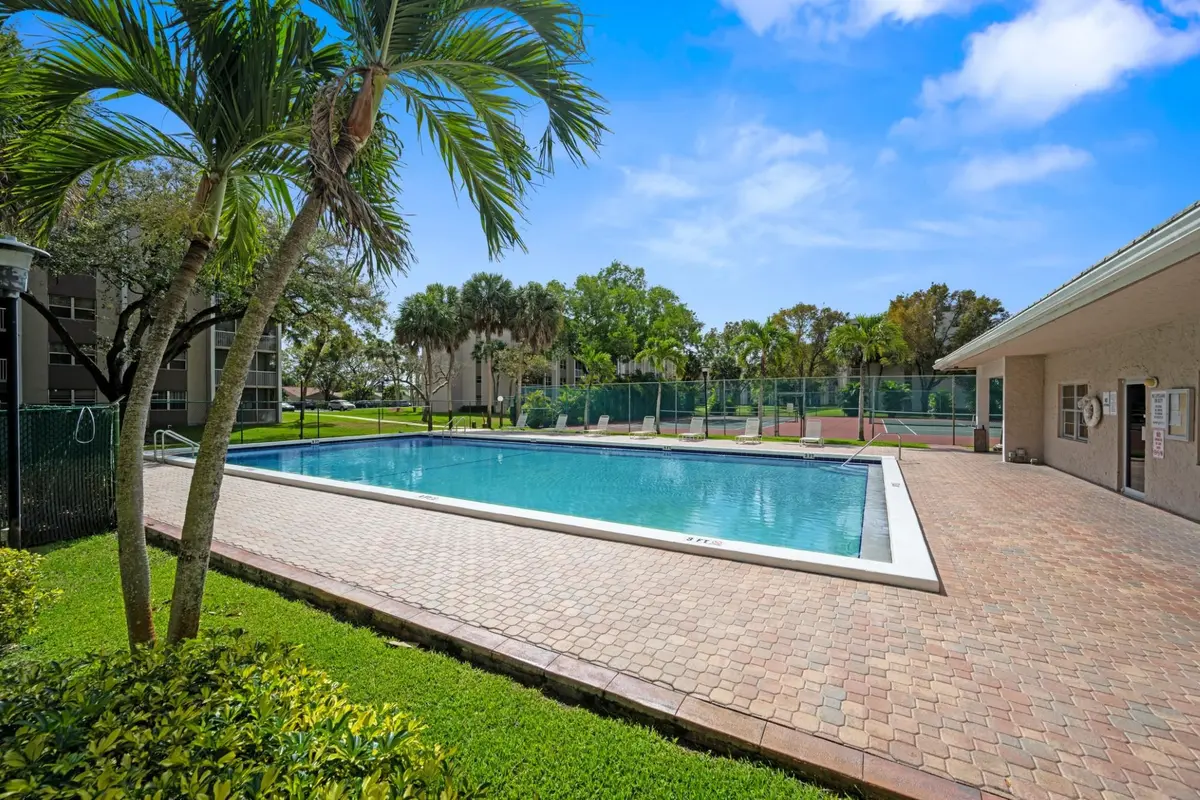Photo 3 at 8735 RAMBLEWOOD Drive 409, Coral Springs