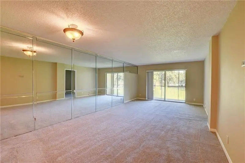 Photo 4 at 8735 RAMBLEWOOD Drive 212, Coral Springs