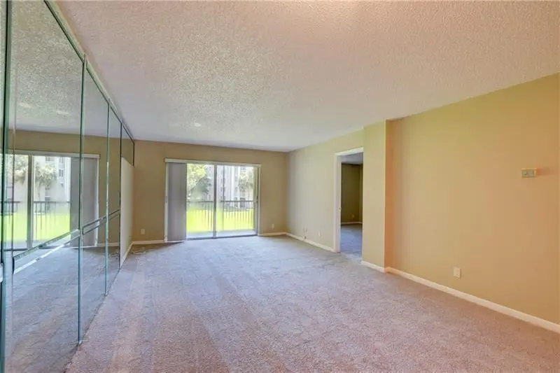 Photo 5 at 8735 RAMBLEWOOD Drive 212, Coral Springs