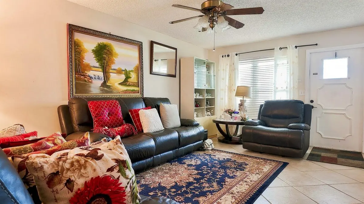 Living Room at 1061 NW 85th Terrace A111, Plantation