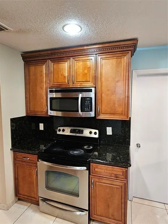 Photo 7 at 9431 NW 24TH Place, Pembroke Pines