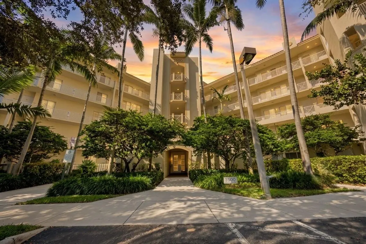front building sunset at 3500 OAKS CLUBHOUSE Drive 510, Pompano Beach