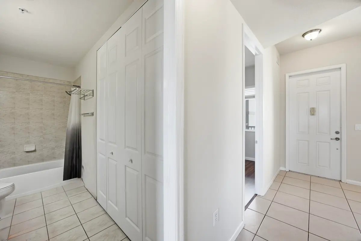 Entrance & Guest bathroom at 3500 OAKS CLUBHOUSE Drive 510, Pompano Beach
