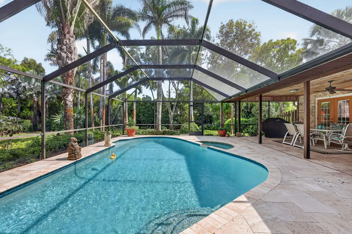 Great pool area w/travertine deck. at 5673 SE Lamay Drive, Stuart
