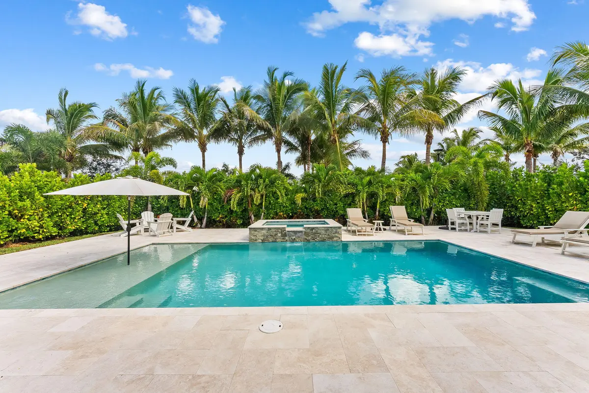 Outdoor pool at 12705 Nevins Lane, Palm Beach Gardens