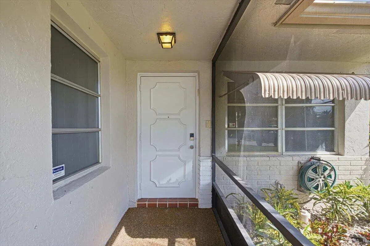 16-Front Door at 6069 LA PALMA Lane, Delray Beach