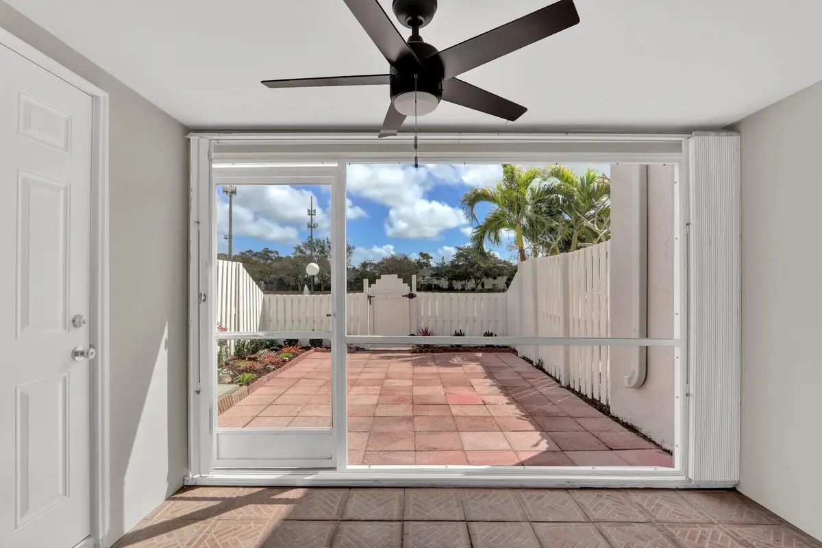 covered patio at 234 FOXTAIL Drive E, Greenacres