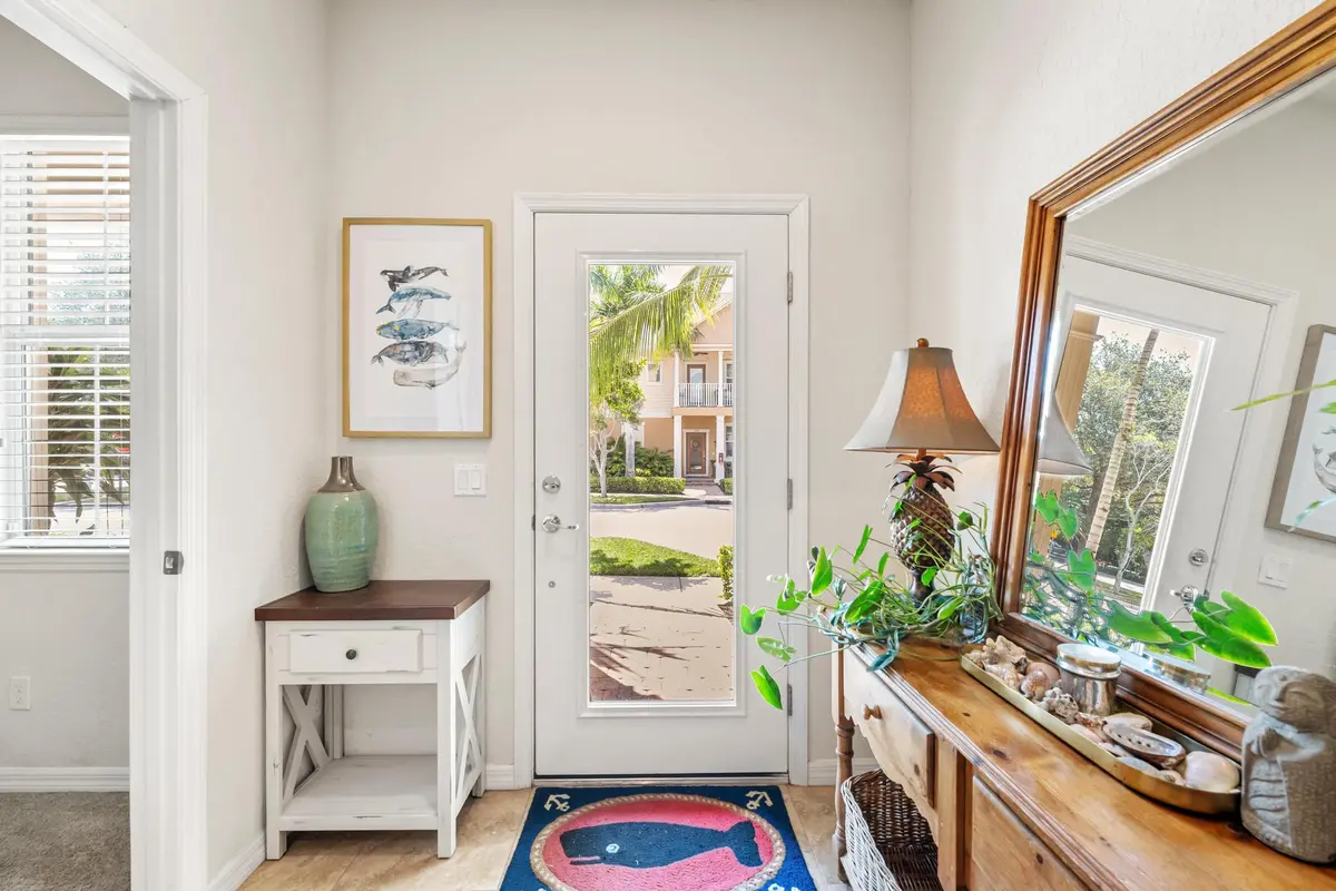 Front Door at 119 BLACK IRONWOOD Road 104, Jupiter